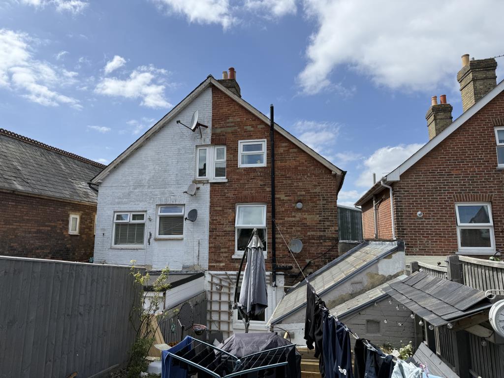 Lot: 108 - THREE-BEDROOM THREE STOREY HOUSE FOR INVESTMENT - Rear of property taken from raised garden